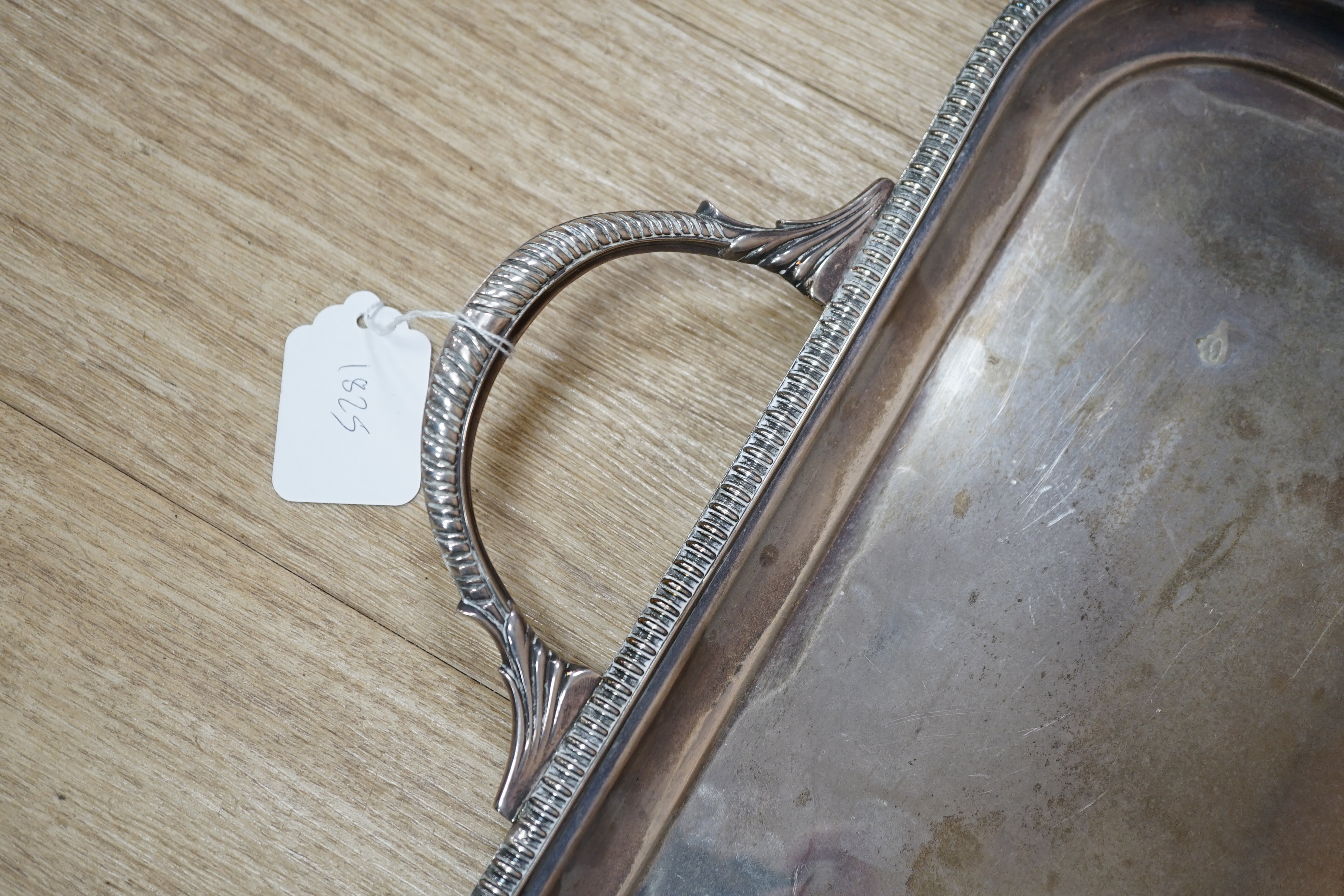 A Elizabeth II silver rectangular two handed tea tray, by James Dixon & Sons, Sheffield, 1958, 69cm, 109.1oz.